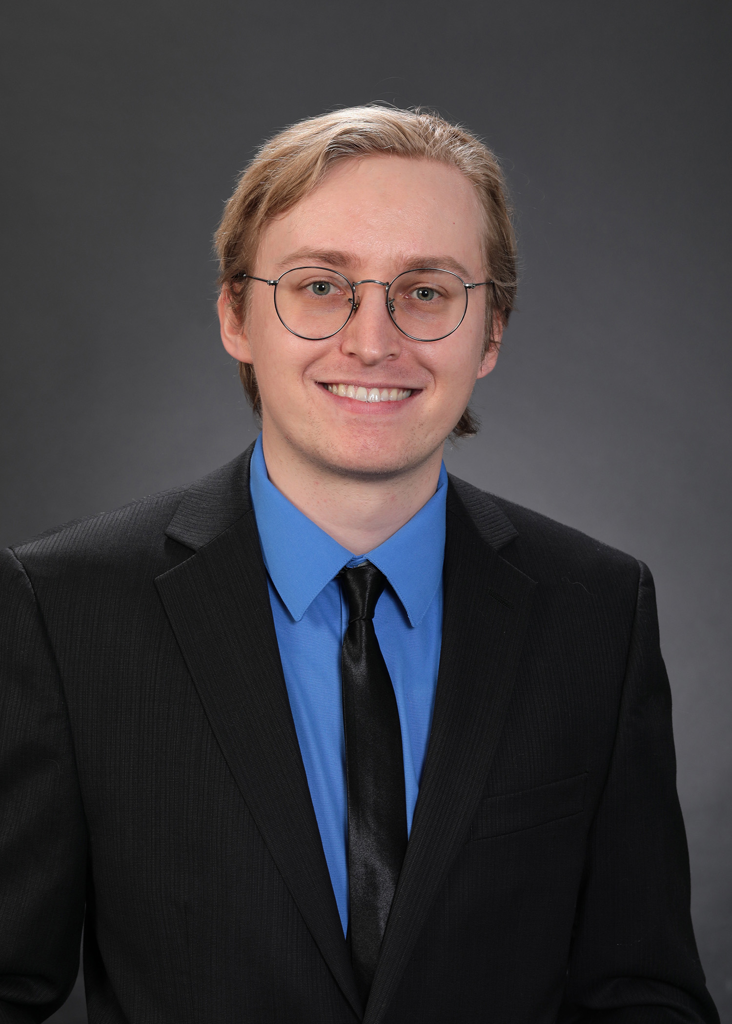 a man in a suit and tie